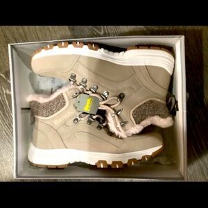 NWT in the box. Super cute boots! Size 9.5 US